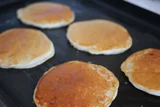 Bisquick Banana Pancakes with Peanut Butter Syrup